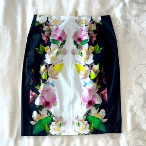 Ted Baker Size 3 knee length pencil skirt, navy with florals, and zipper detail